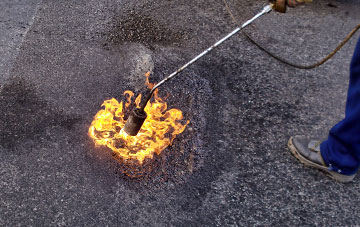 Four Crosses flat roofing repairs