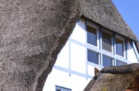 find rated Four Crosses thatchers